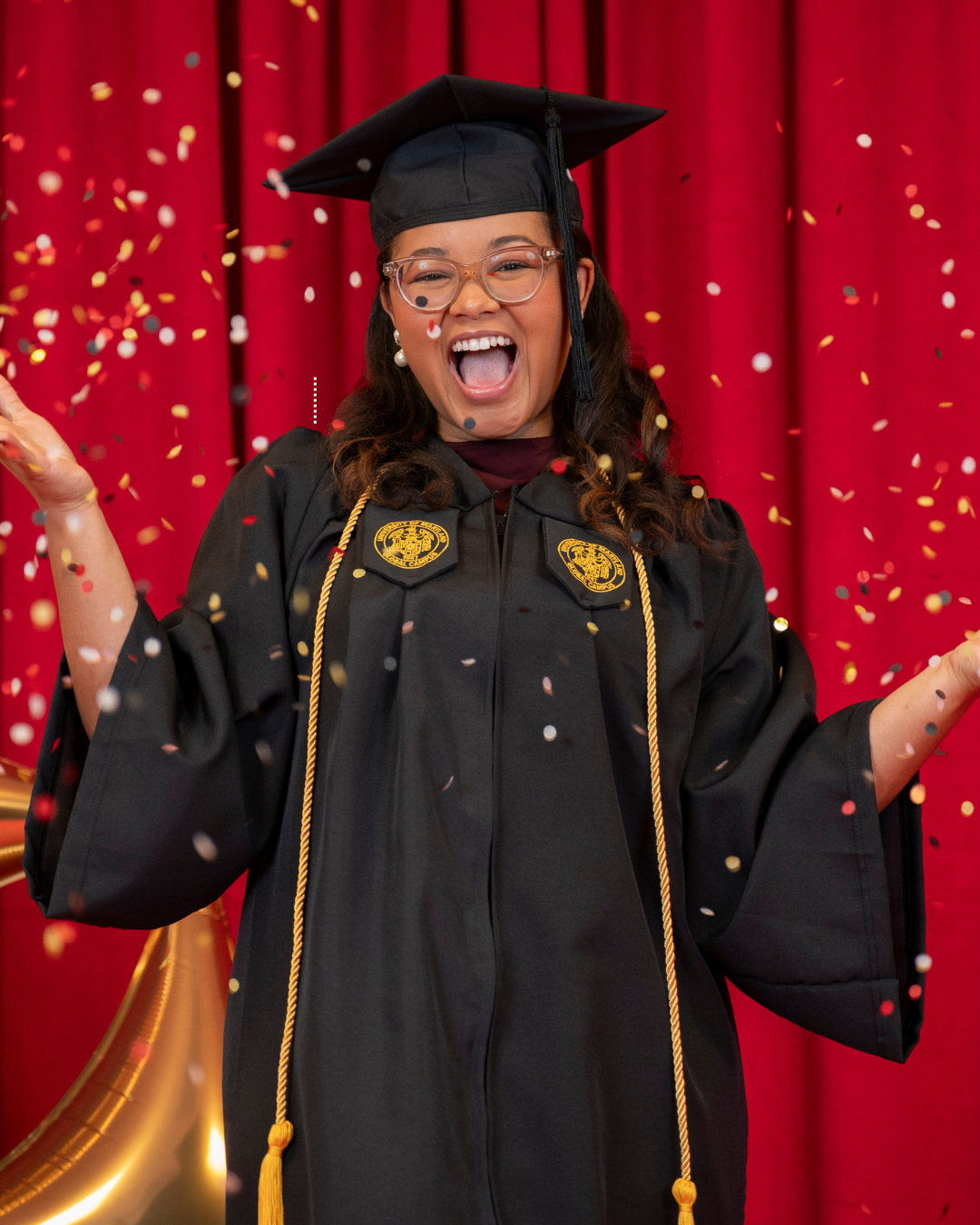 Photo of UMGC graduates in regalia