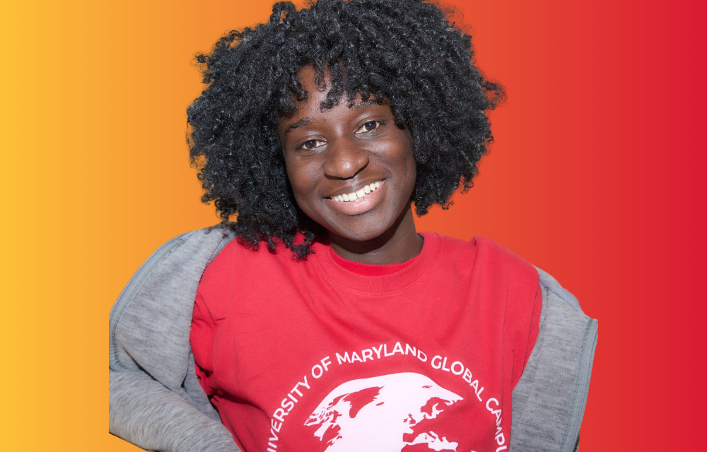 Girl in red UMGC global t-shirt