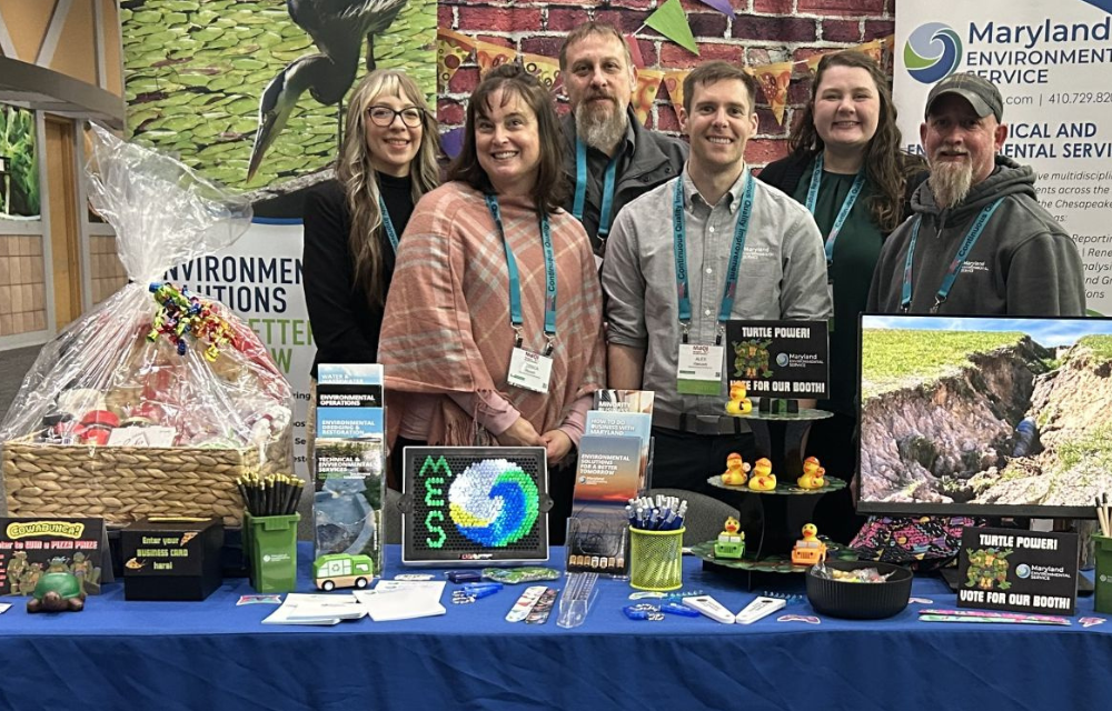 Photo of UMGC alumna Jessica Riesett with Maryland Environmental Service Staff Members