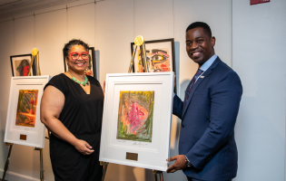 UMGC President Gregory Fowler and UMGC Arts Program commissioned artist Alec Simpson